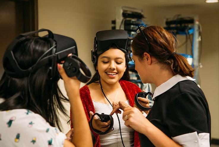 Students and professor with virtual reality gear